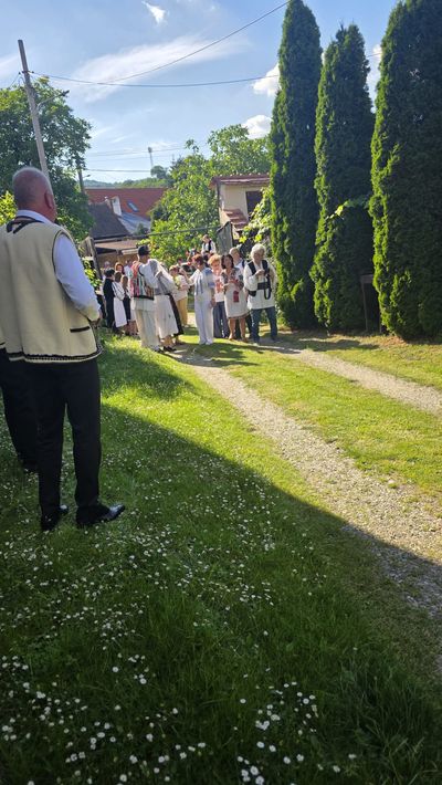 Musicians and guests, at a party in the guesthouse courtyard