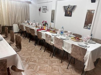 The dining room, set for a group dinner