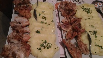 A main course of roasted meat and mashed potatoes, served to guests